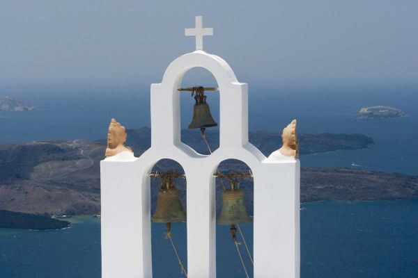Greece, Santorini Church bell tower with sea